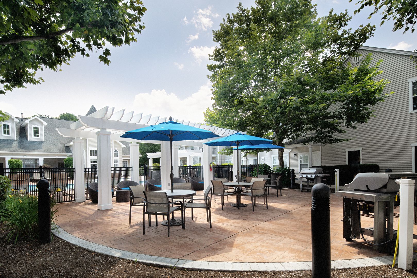 Patio seating area with tables.