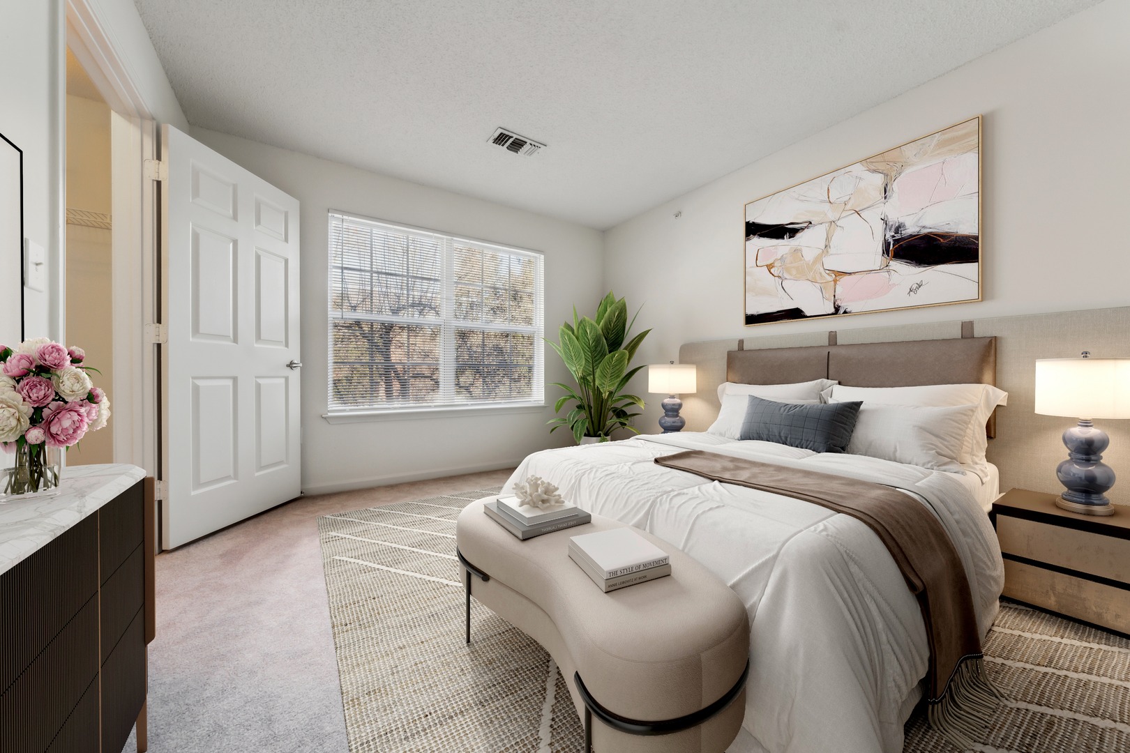 Second bedroom with a bed and nightstand.